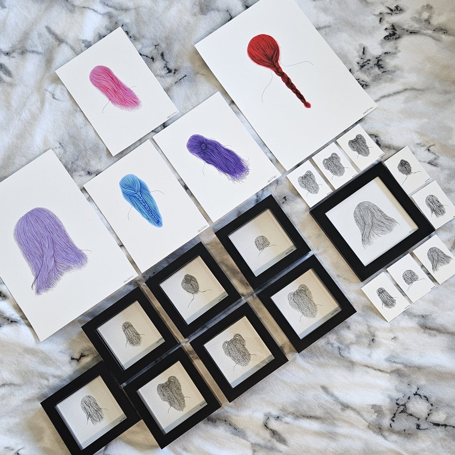 The image shows every piece in the hair collection against a marble background.